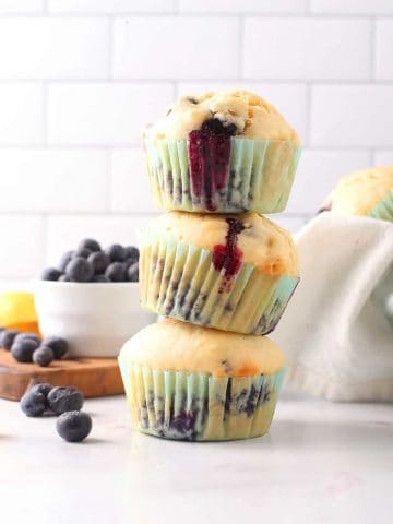 Stack of three vegan blueberry muffins