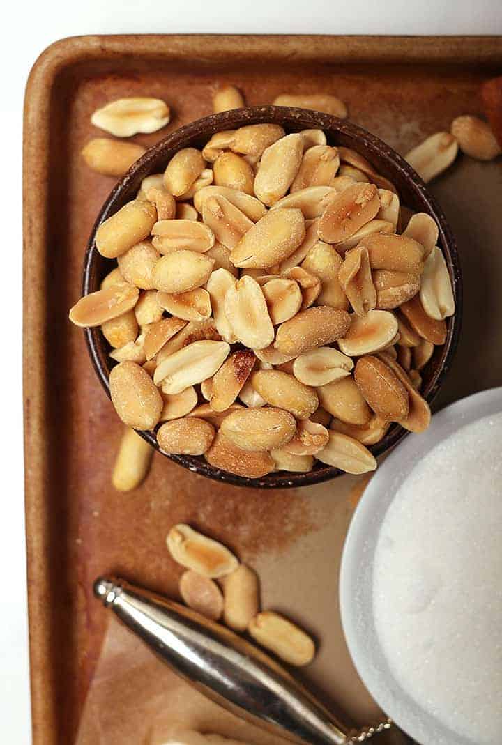 Bowl of peanuts and sugar