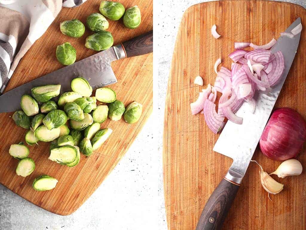 Chopped Brussels sprouts and red onion on a cutting board
