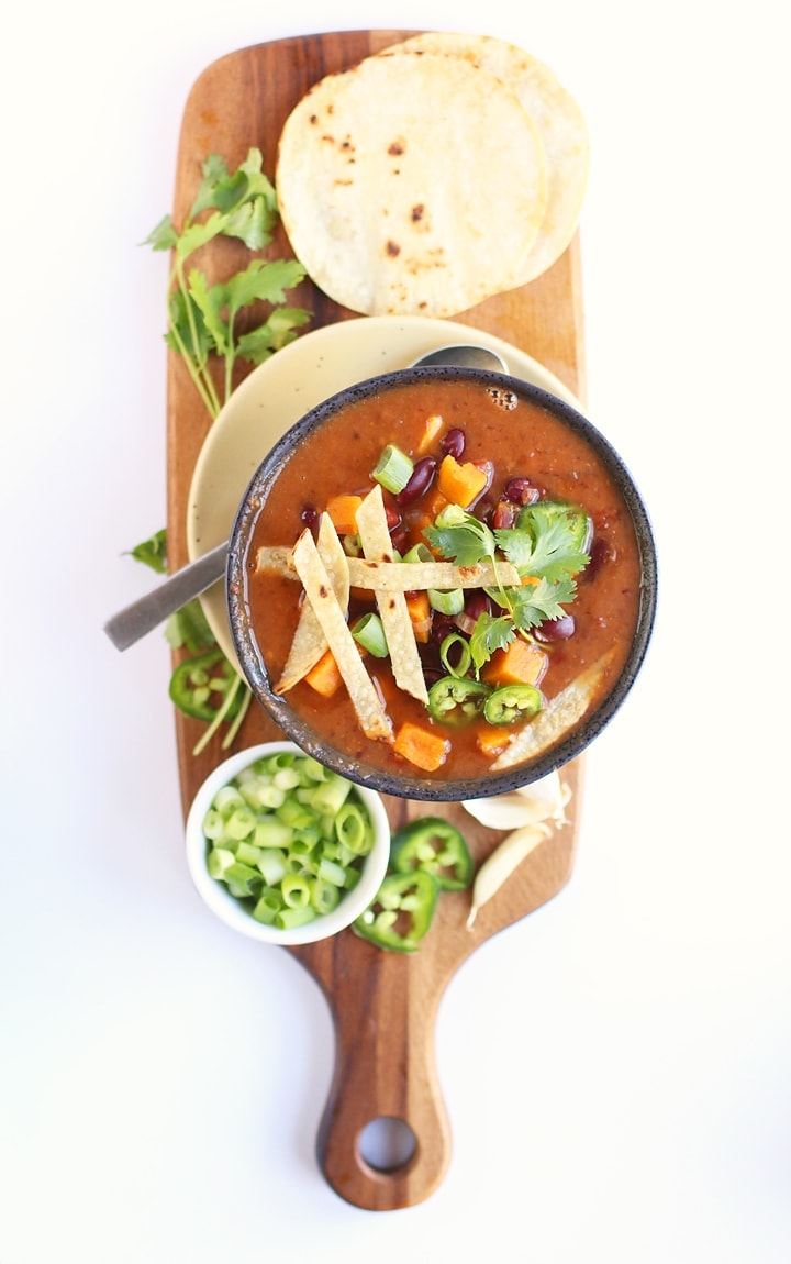 Sweet Potato Chili in a small bowl with fresh toppings