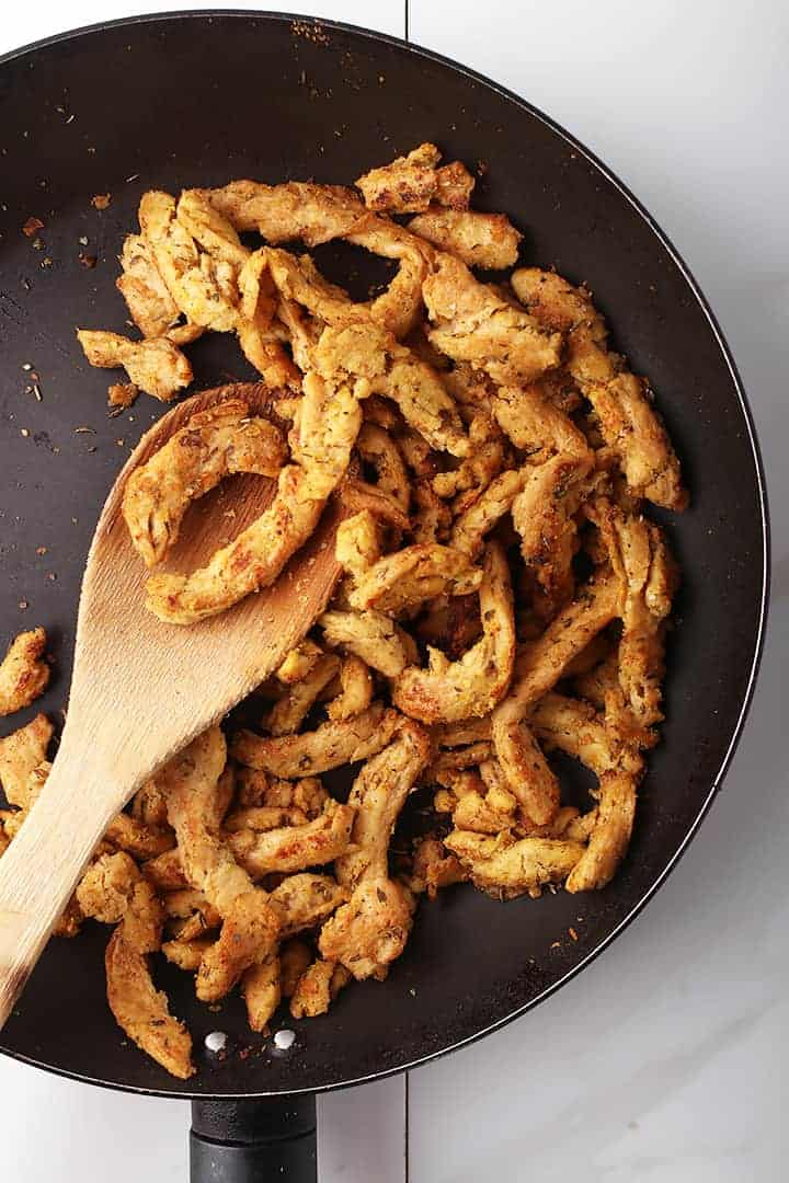 Chicken-flavored soy curls in skillet