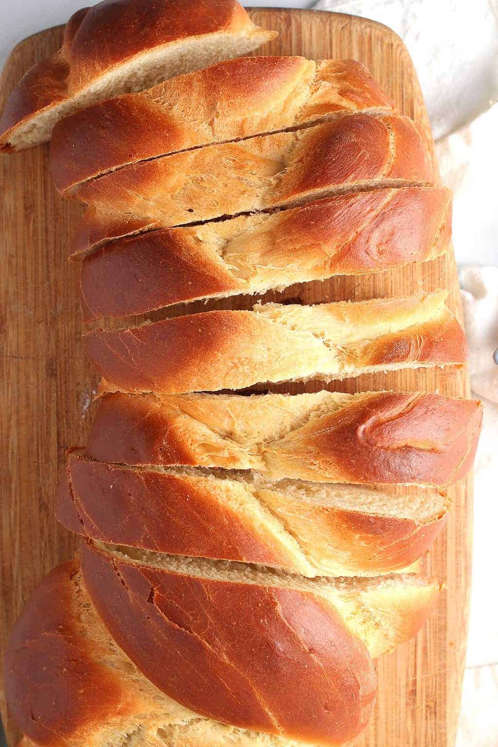 Slices of challah bread on cutting board