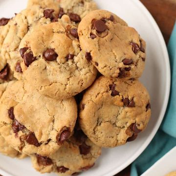 A white plate filled with Vegan Chocolate Chip Cookies