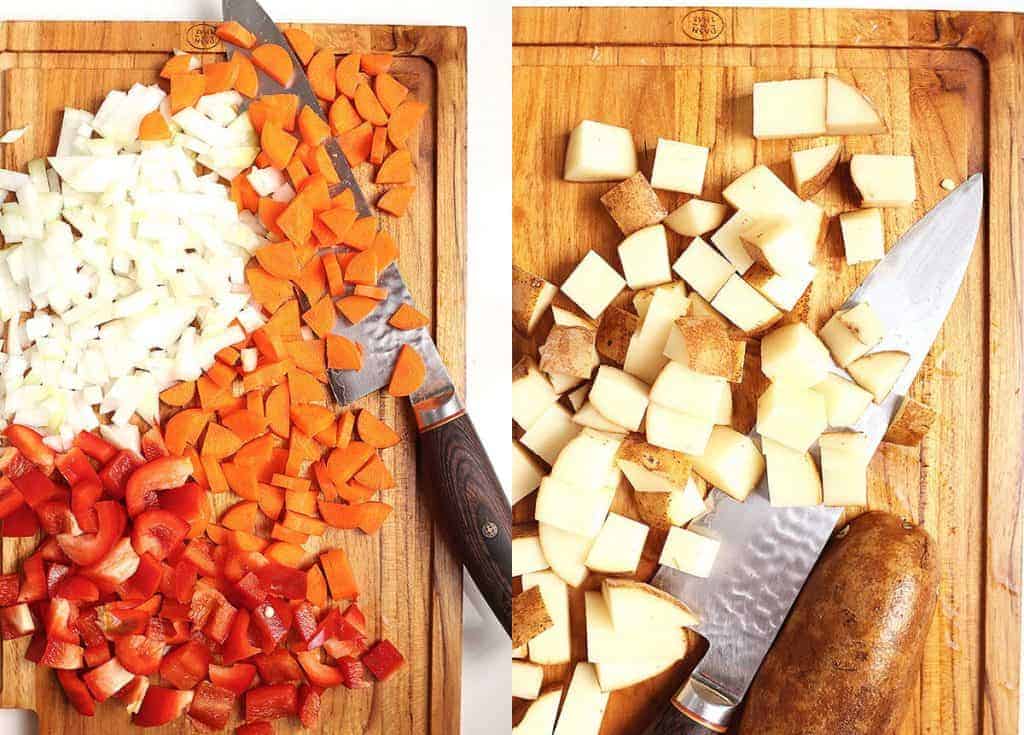 Chopped vegetables on a cutting board with a knife
