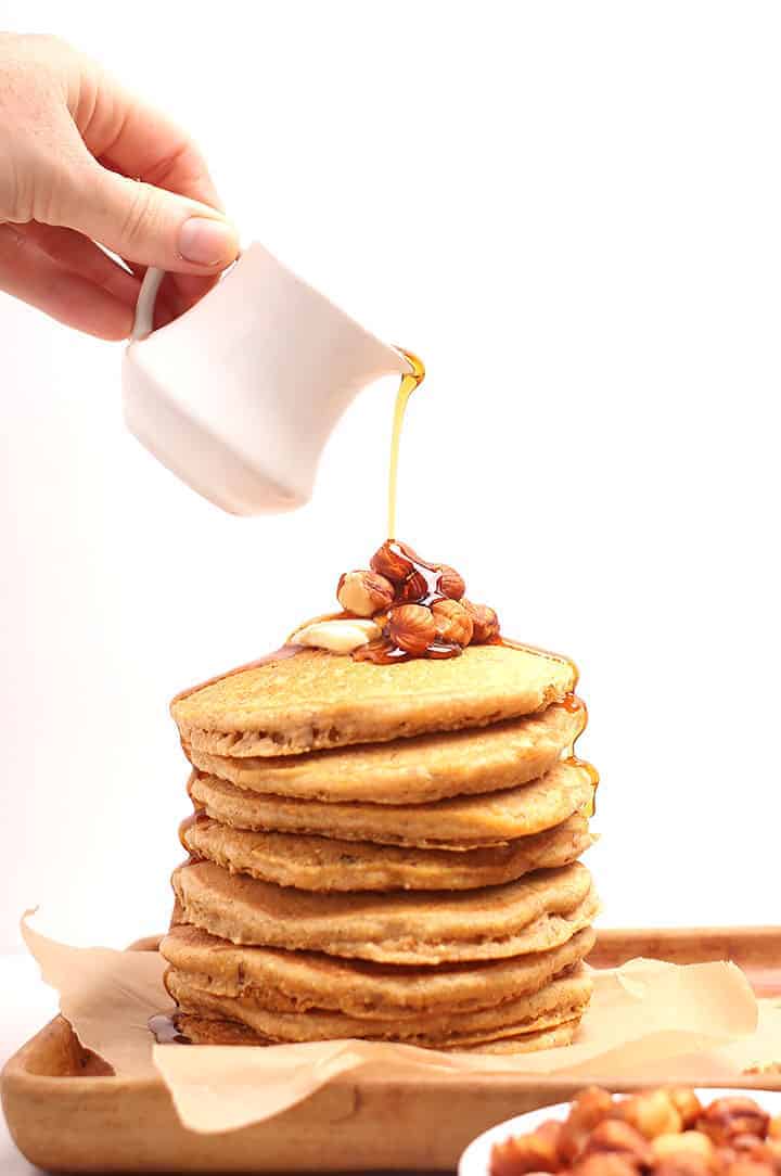 Stack of corncakes with maple syrup