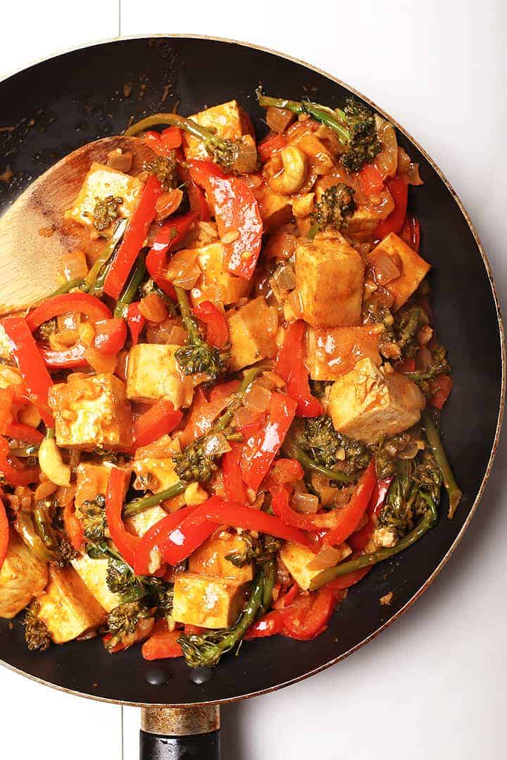 Sautéed tofu and vegetables in a skillet