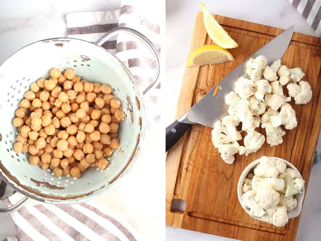 Chickpeas in a colander and bite-sized cauliflower florets on a cutting board