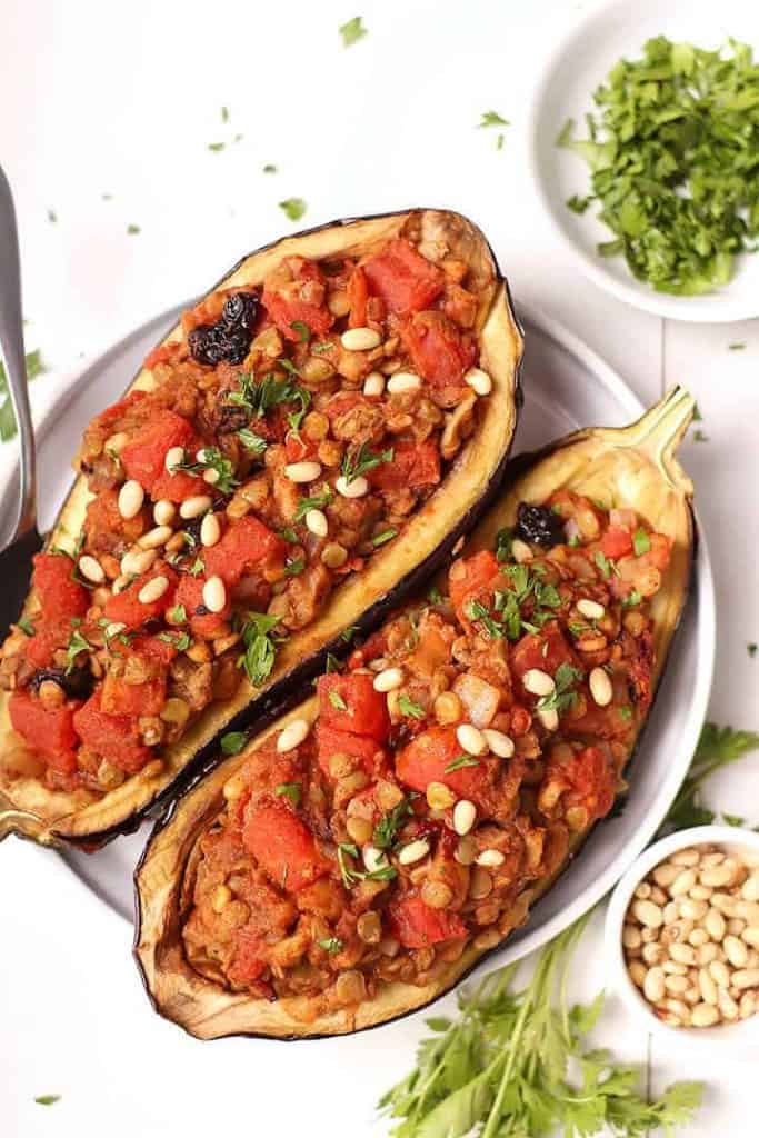 Two Moroccan Stuffed Eggplant on white plate