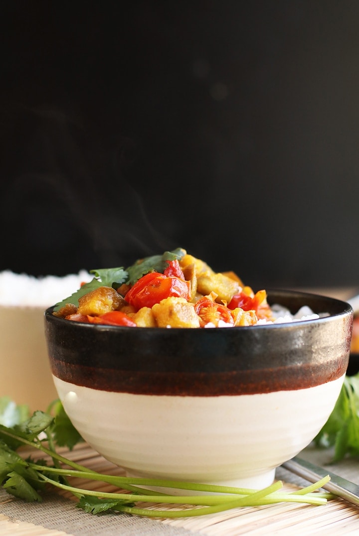 Eggplant Chickpea Curry in a black and white bowl