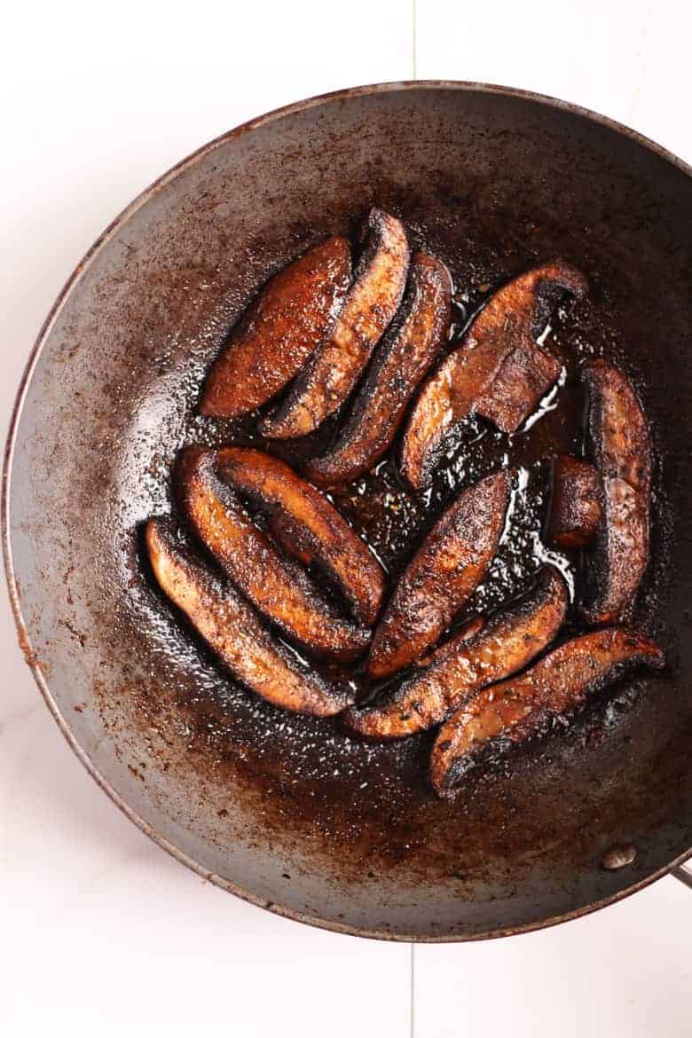 Sautéed portobello in a fry pan
