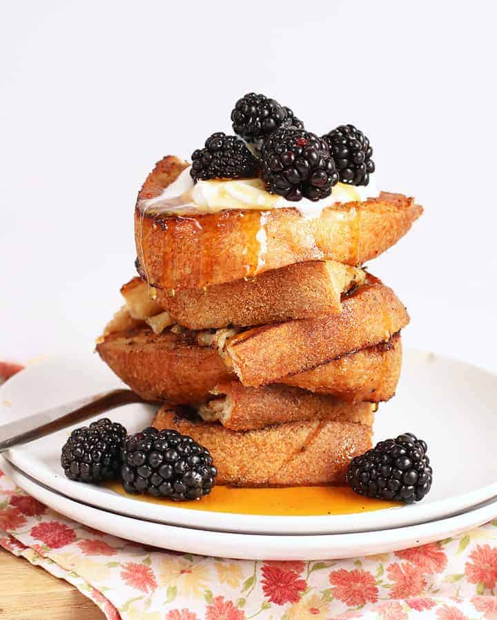 Stack of Vegan French Toast on a white plate