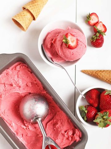 Strawberry ice cream on white background