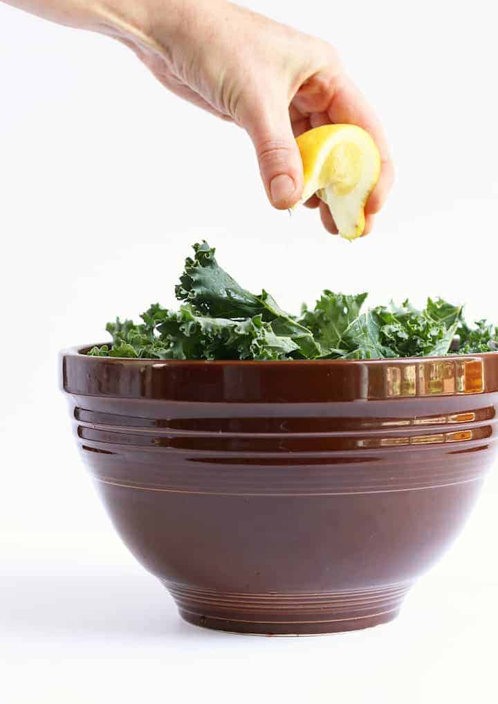 Bowl of kale with fresh lemon juice
