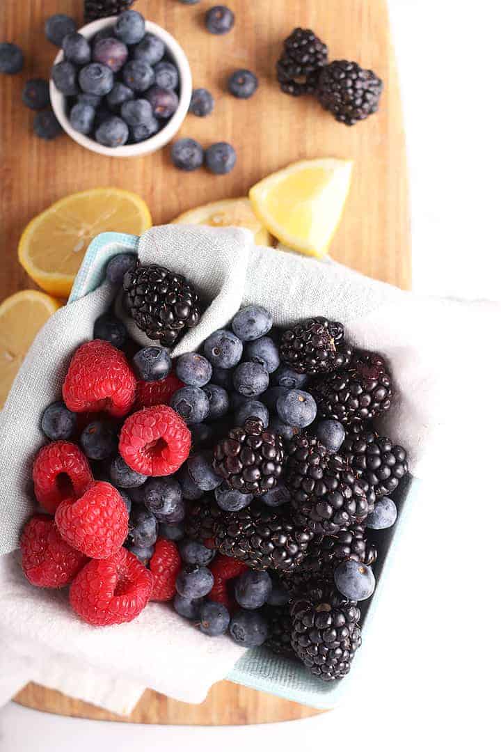 Mixed berries on a cutting board