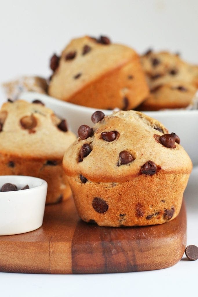 Vegan Chocolate Chip Muffins on a wooden board