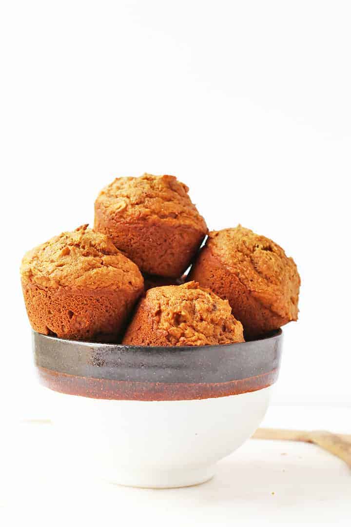 Finished muffins in a white bowl