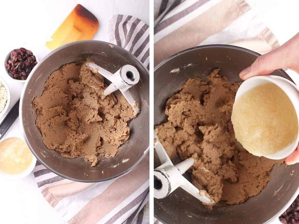 Cookie dough in a metal mixing bowl with the paddle attachment 