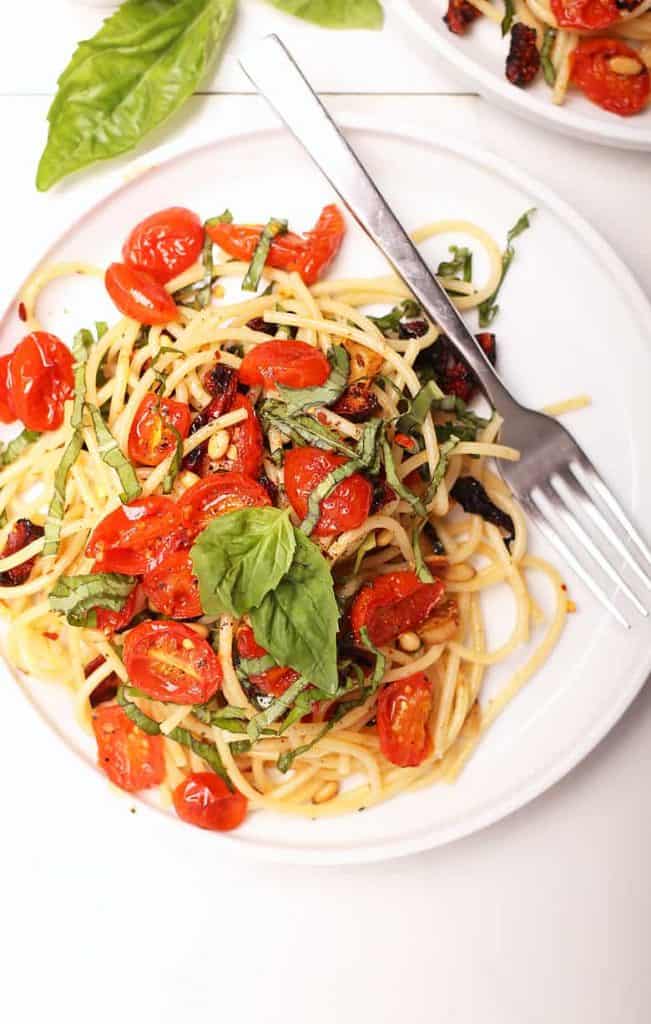 One plate of vegan pasta with cherry tomatoes