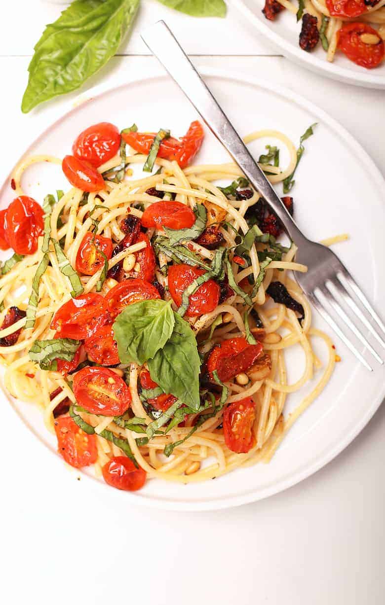 Vegan pasta with roasted tomatoes on a plate