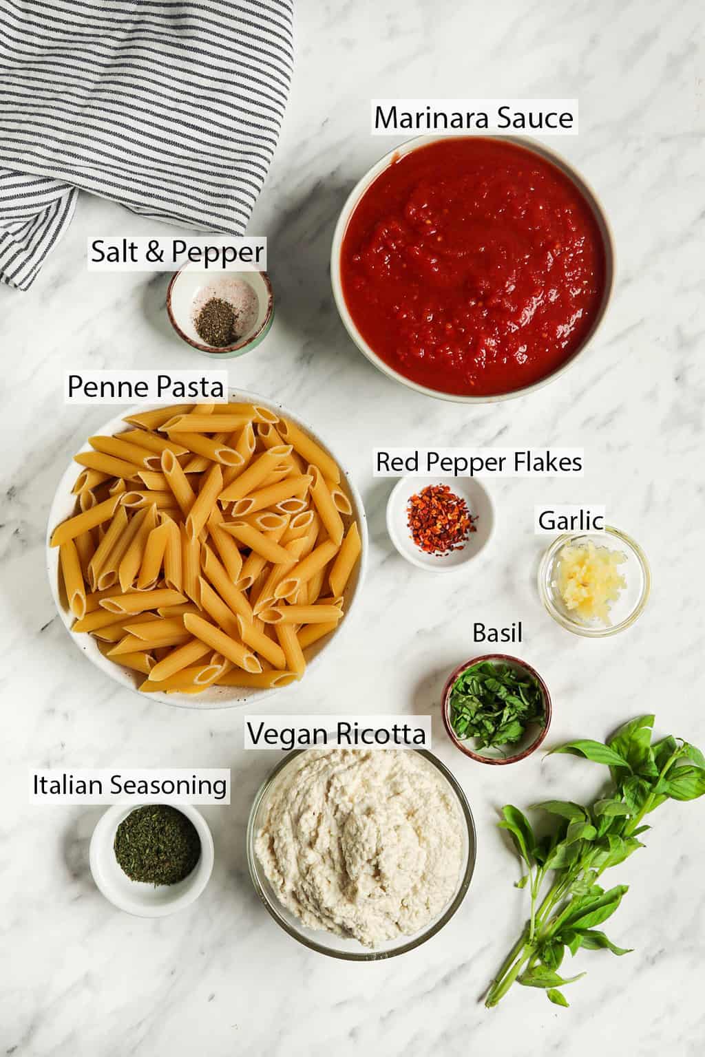 marinara sauce, salt, pepper, penne pasta, red pepper flakes, garlic, basil, ricotta, Italian seasoning for vegan ziti