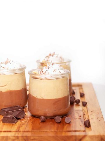 Chocolate Peanut Butter Cup pudding in glass jars