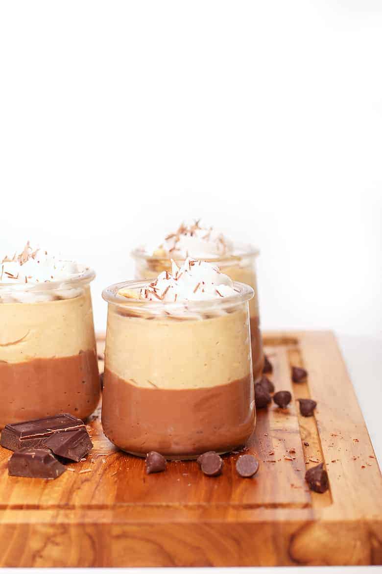 Chocolate Peanut Butter Cup pudding in glass jars