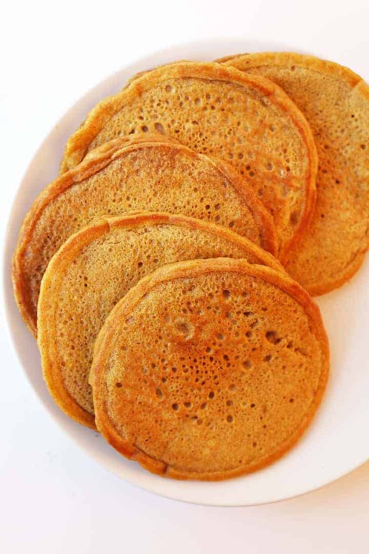 Finished pancakes on a white plate