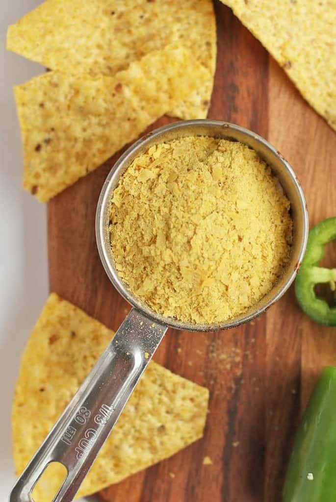 Nutritional yeast in a measuring cup