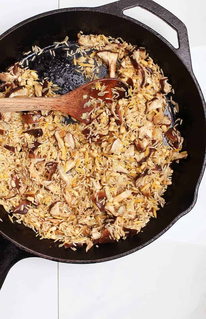 Uncooked Rice Pilaf in cast iron skillet