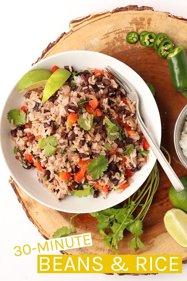 This 30-minute Black Beans and Rice recipe if filled with protein and packed with flavor for a wholesome vegan and gluten-free meal. Delicious and so easy to make, it should be part of your weekly rotation. #vegan #glutenfree #veganrecipes #riceandbeans #easydinners