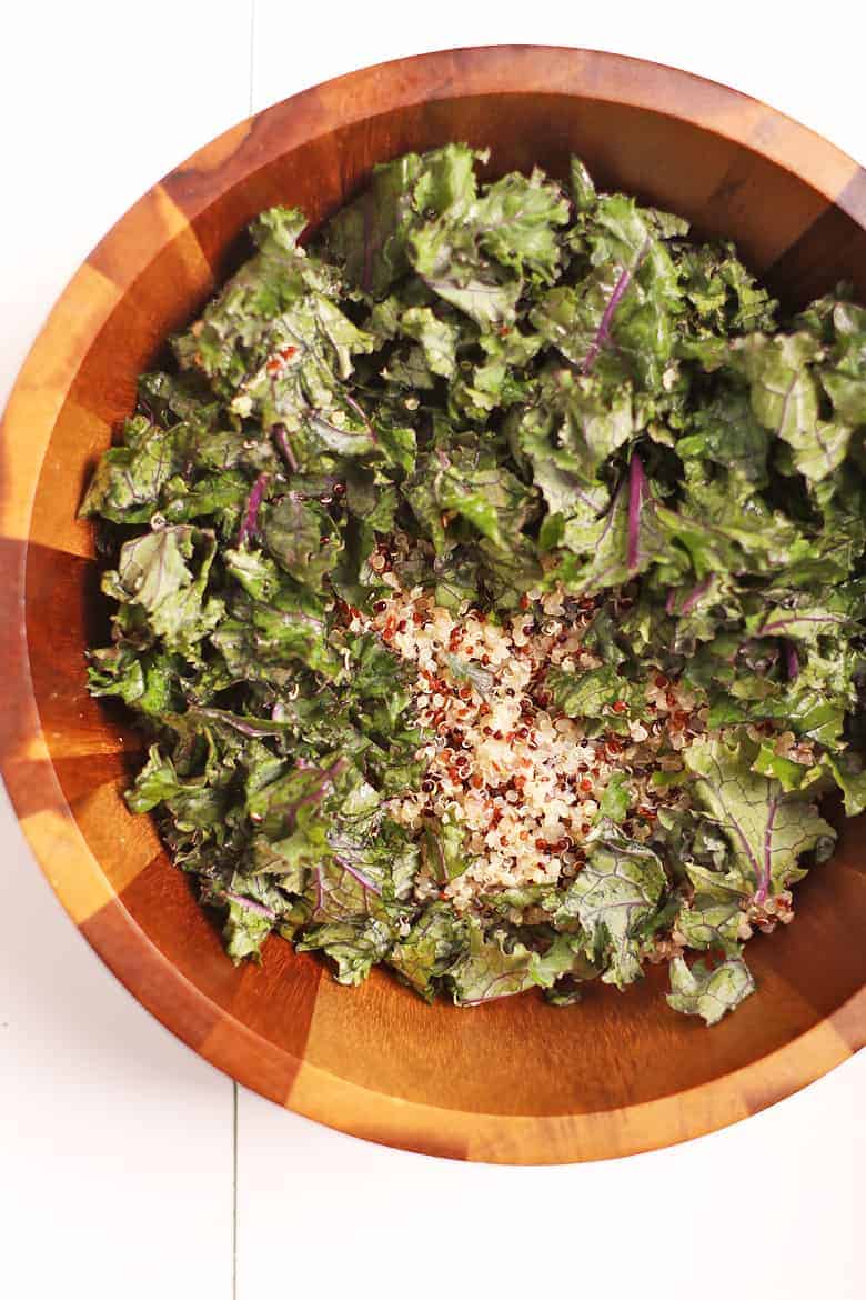 Kale and quinoa in a wooden bowl
