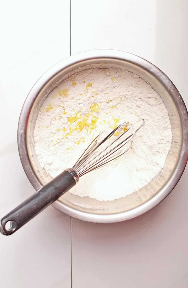 Flour and lemon zest in a bowl