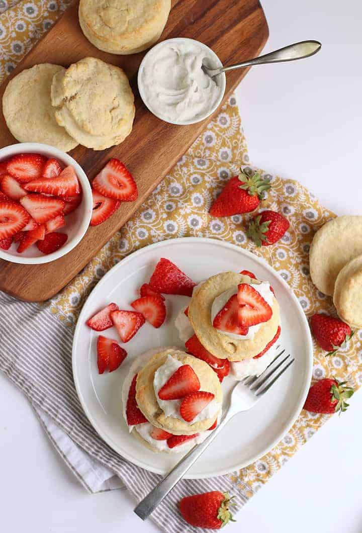 Finished shortcakes on a white plate with a fork 