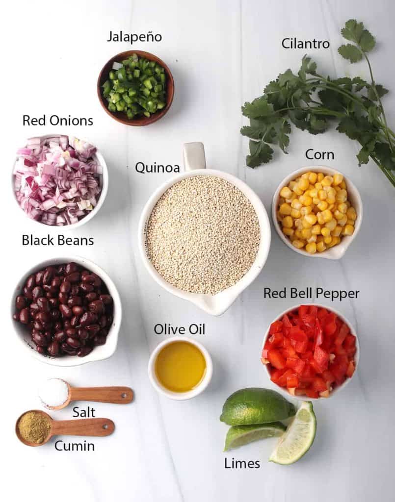 ingredients for southwest quinoa salad recipe laid out on white tabletop