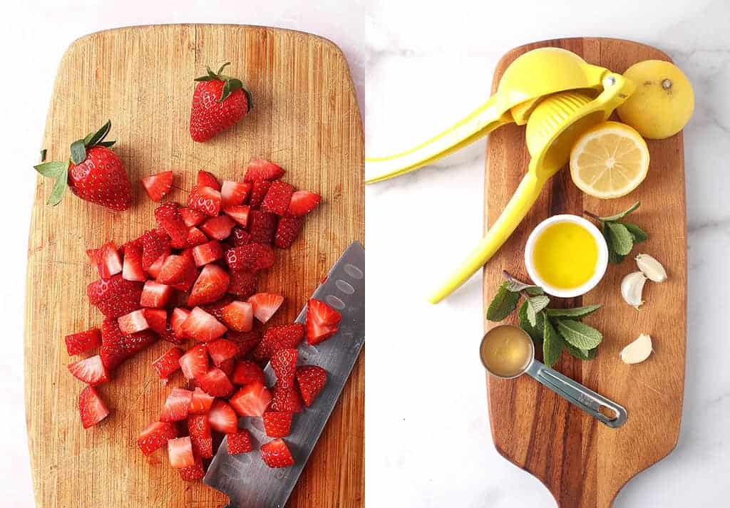 Chopped strawberries and juiced lemons on a cutting board