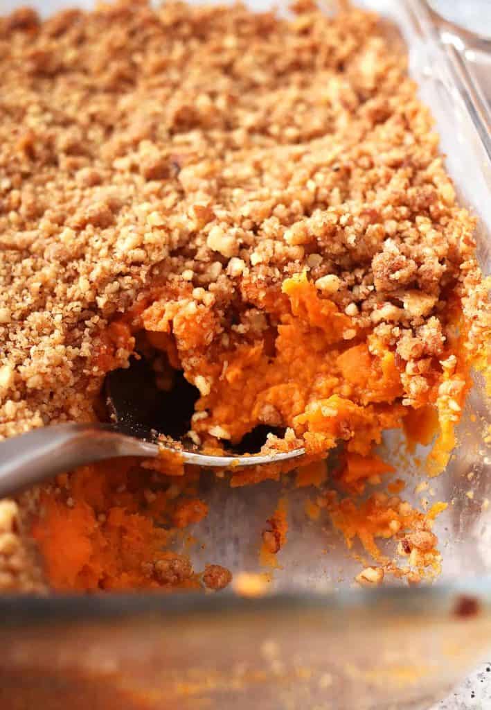 Finished sweet potato casserole in a glass dish