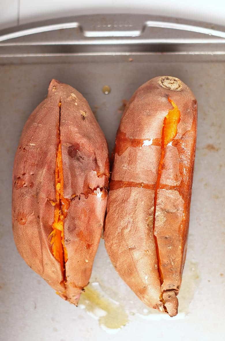 Cooked sweet potatoes sliced in half