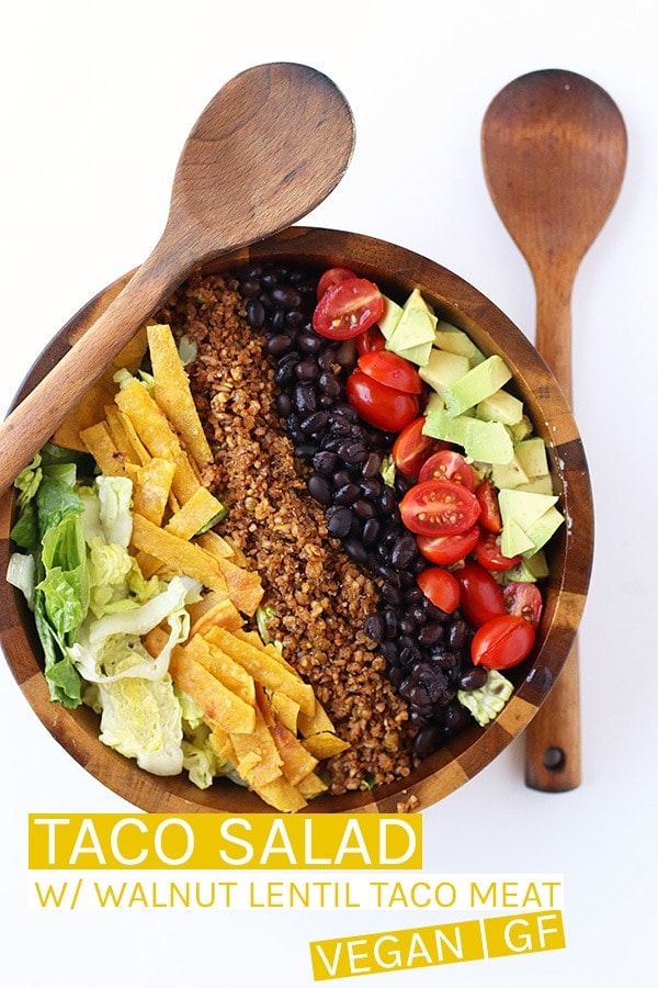 An easy and healthy Vegan Taco Salad. Made with a lentil/walnut taco meat, black beans, cherry tomatoes, and avocado and dressed with creamy avocado salsa for a wholesome, plant-based, gluten-free meal.