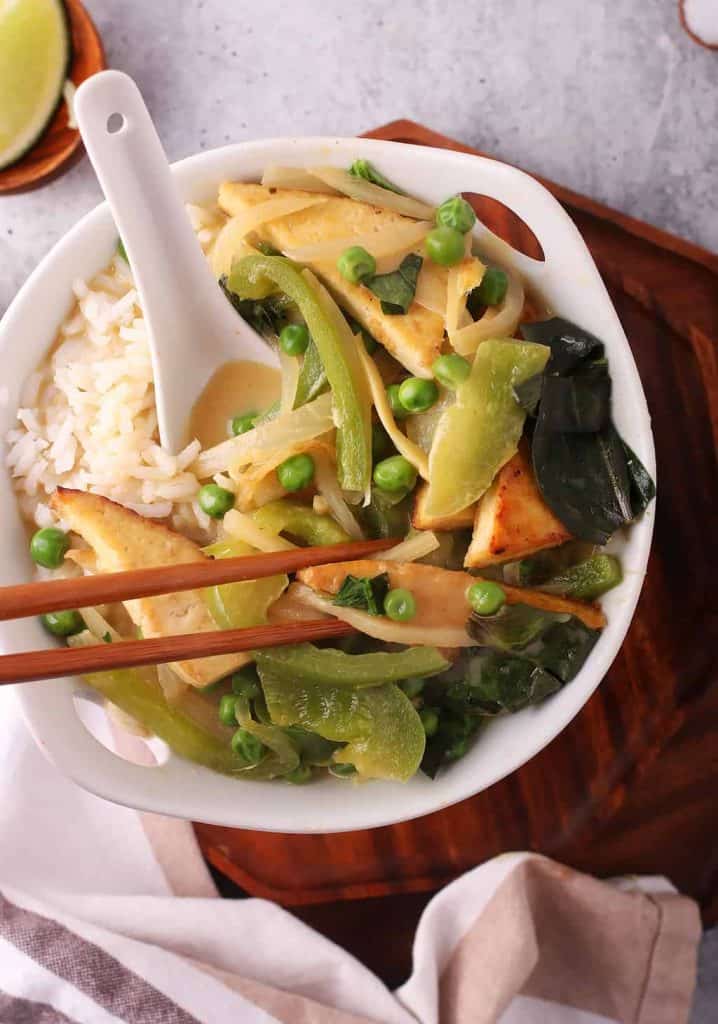 Bowl of Thai Green Curry with chop sticks