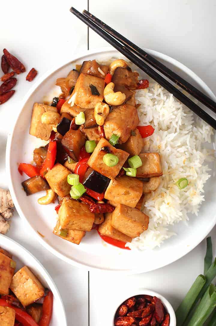 Kung Pao Tofu on white plate with rice