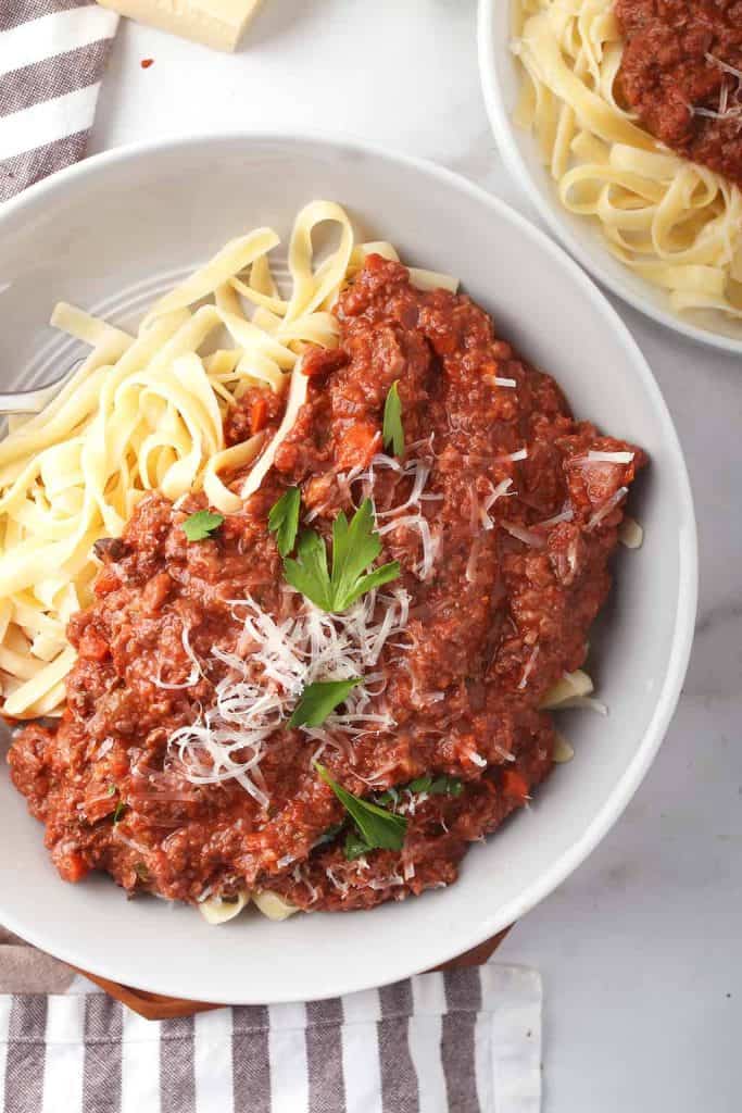 Plate of vegan pasta with bolognese sauce
