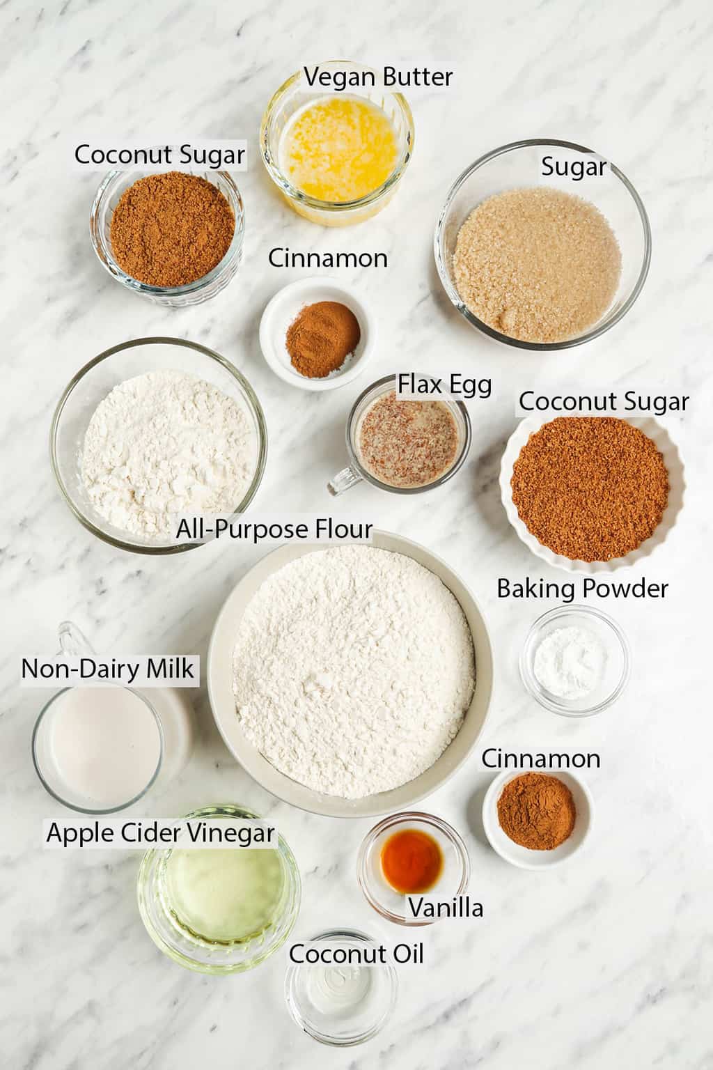 coconut sugar, cinnamon, sugar, flax egg, flour, baking powder, non dairy milk, apple cider vinegar, vanilla, and coconut oil