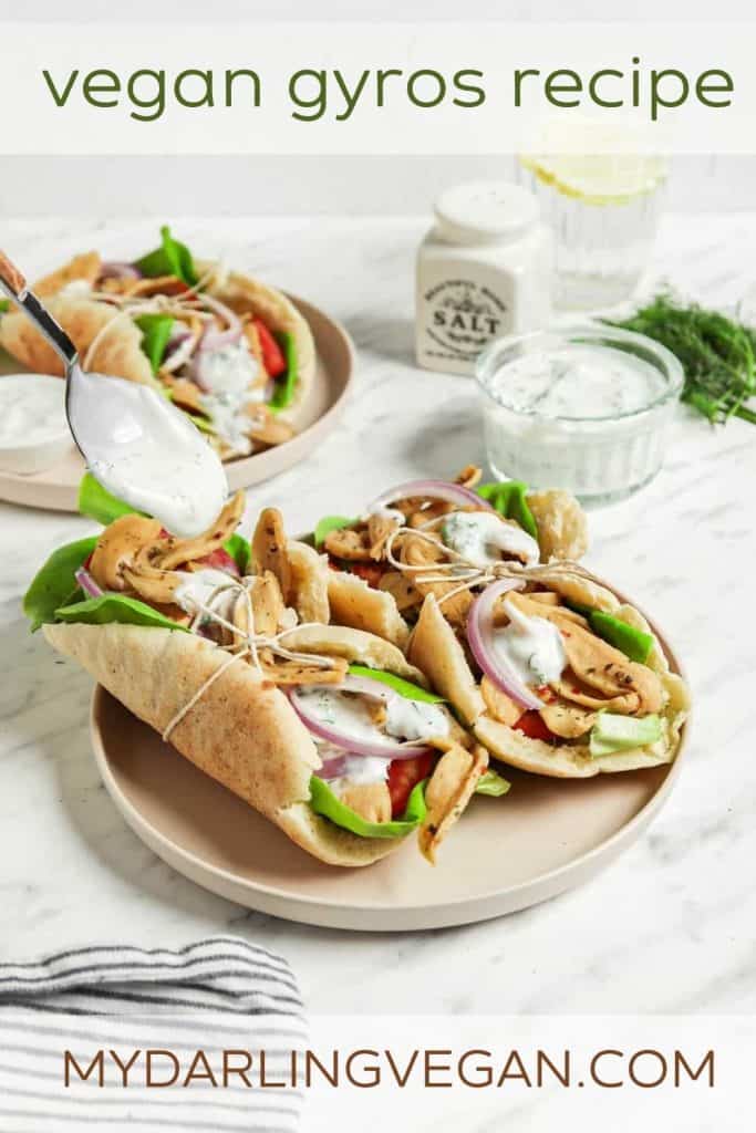 spoon drizzling tzatziki sauce over vegan gyros for Pinterest graphic