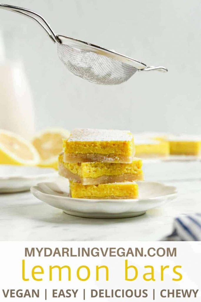 three lemon bars with powdered sugar