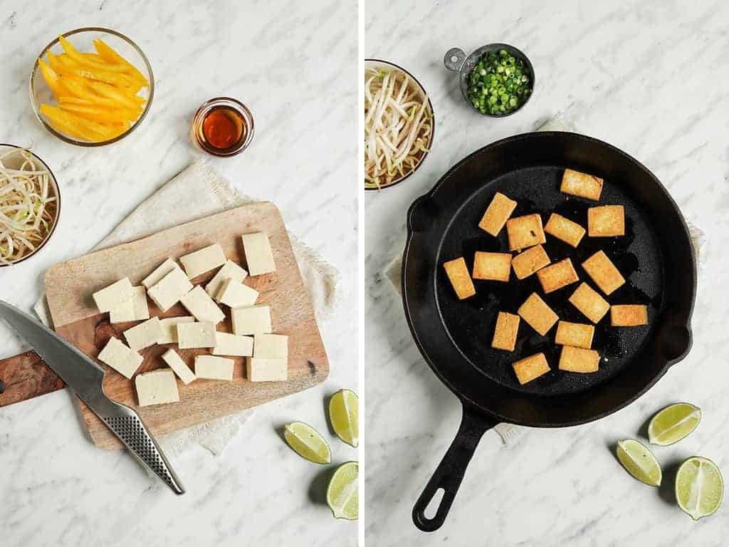 cubed tofu on cutting board transferred to cast iron skillet