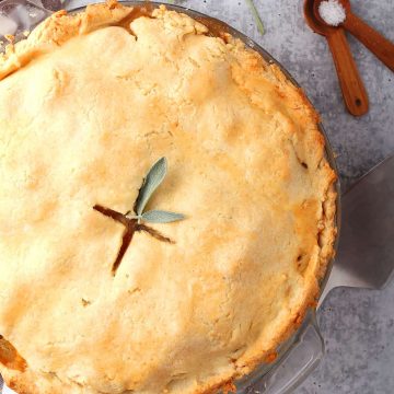 Whole finished pot pie with fresh sage