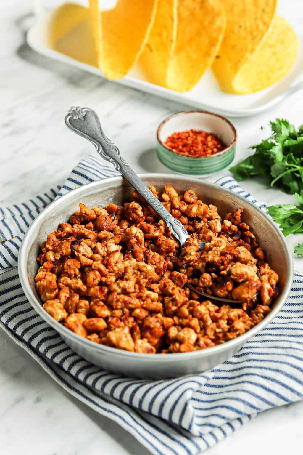 vegan taco meat in bowl with spoon