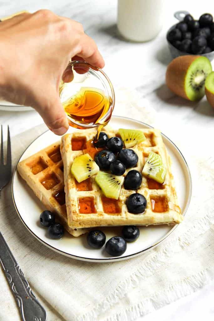 classic vegan waffles served with blueberries, kiwi and maple syrup