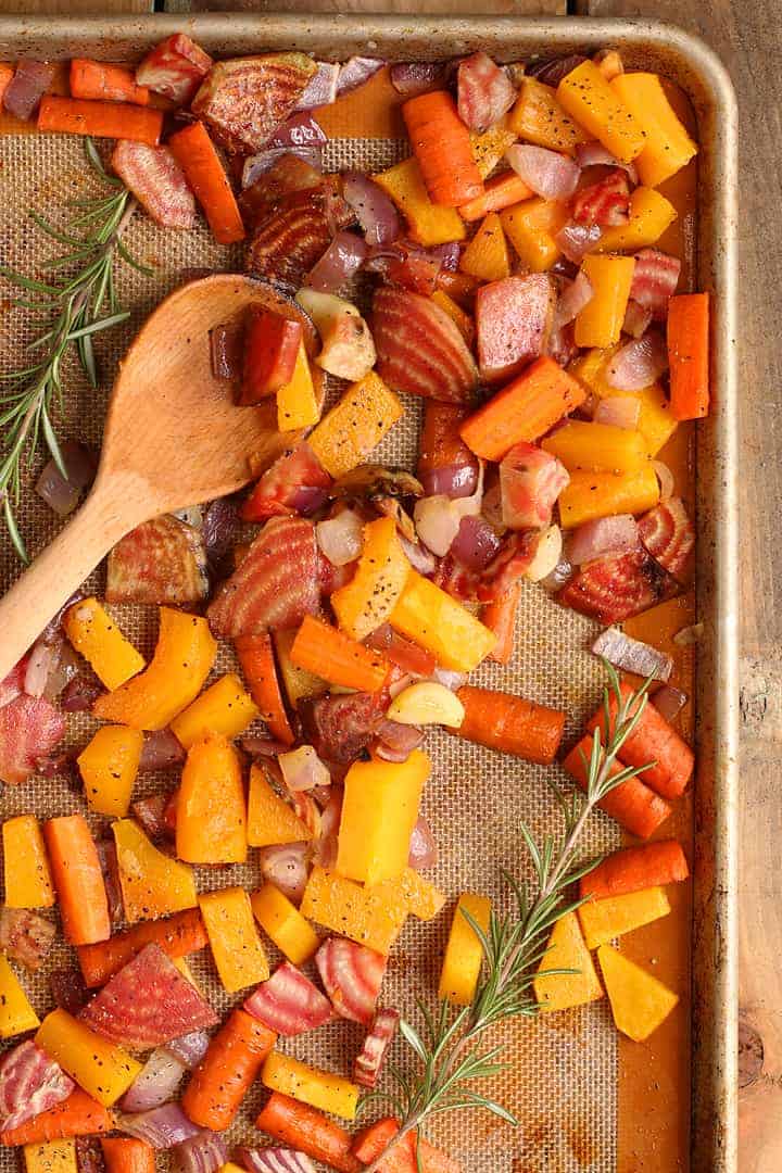 Chopped and roasted vegetables on a baking sheet. 