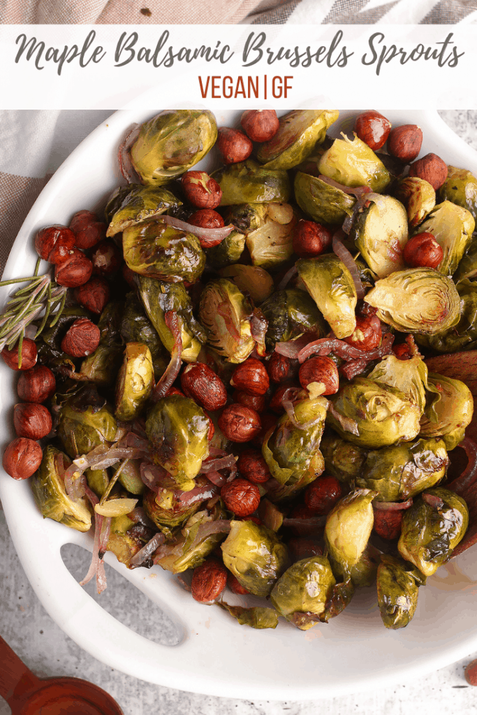 Maple Balsamic Brussel Sprouts are a sweet and savory vegan side dish perfect for your next holiday dinner. They are perfectly tender roasted and tossed together with roasted hazelnuts and rosemary for a delicious harvest dish.
